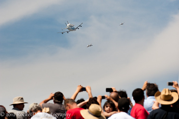The crowd watched her go.
